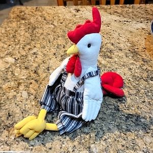 Stuffed rooster with weighted bottom.